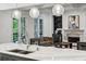 Open concept kitchen with island, countertops, and view of the living room at 369 Pinecrest Ne Rd, Atlanta, GA 30342