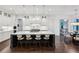 Bright kitchen with a large island, stylish seating, and stainless steel appliances at 369 Pinecrest Ne Rd, Atlanta, GA 30342