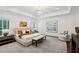 A main bedroom features tray ceilings, a large window and sitting area at 369 Pinecrest Ne Rd, Atlanta, GA 30342