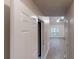 Inviting entryway showcasing a view into the open living area with hardwood floors and a ceiling fan at 3979 Sharon Spgs, Powder Springs, GA 30127