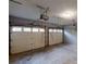 Spacious two-car garage with ample lighting and concrete floors, ready for parking and storage at 3979 Sharon Spgs, Powder Springs, GA 30127