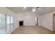 Open living space featuring hardwood floors, a fireplace, a vaulted ceiling, and abundant natural light at 3979 Sharon Spgs, Powder Springs, GA 30127