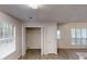 Bright room showcasing windows, open closet space, and natural light from the exterior at 3979 Sharon Spgs, Powder Springs, GA 30127