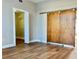 Bedroom with wood floors and access to the closet at 502 Pryor St # 207, Atlanta, GA 30312