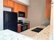 Modern kitchen with granite countertops and stainless steel appliances at 502 Pryor St # 207, Atlanta, GA 30312