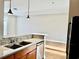 Bright kitchen with granite counters and stainless steel dishwasher at 502 Pryor St # 207, Atlanta, GA 30312