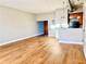 Bright living room with wood floors and modern kitchen appliances at 502 Pryor St # 207, Atlanta, GA 30312