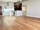 Spacious living room featuring wood floors and stainless steel appliances at 502 Pryor St # 207, Atlanta, GA 30312