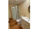 Functional bathroom with shower, toilet, and vanity with a sink at 5098 Meadows Rd, Powder Springs, GA 30127