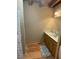 Cozy bathroom with wood flooring and plenty of cabinet storage space at 5098 Meadows Rd, Powder Springs, GA 30127