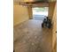 Spacious garage features an ATV, with ample room for vehicles and storage at 5098 Meadows Rd, Powder Springs, GA 30127