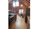 Bright kitchen with stainless steel appliances and hardwood flooring at 5098 Meadows Rd, Powder Springs, GA 30127