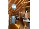 Open concept kitchen, wooden interior, and chandelier light at 5098 Meadows Rd, Powder Springs, GA 30127