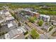 Aerial view of neighborhood with mature trees, street parking, and residential homes at 815 Paden St, Woodstock, GA 30188