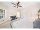 Bedroom with ceiling fan, ensuite access, double doors and great natural light at 815 Paden St, Woodstock, GA 30188