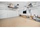 Spacious garage with coated floor and overhead storage racks at 815 Paden St, Woodstock, GA 30188