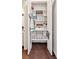 Spacious pantry with adjustable shelving and ample storage space, illuminated by overhead lighting at 815 Paden St, Woodstock, GA 30188