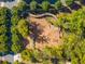 Aerial shot of the playground, including climbing structures, bridges, and green spaces at 815 Paden St, Woodstock, GA 30188