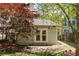 Charming backyard studio has a double door entry and is ready to be used as a home office or flex space at 136 Flora Ne Ave, Atlanta, GA 30307