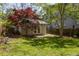 Charming backyard studio is a great addition to this spacious outdoor space at 136 Flora Ne Ave, Atlanta, GA 30307