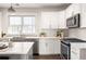 Bright, modern kitchen with stainless steel appliances, and ample counter space at 136 Flora Ne Ave, Atlanta, GA 30307