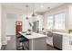 Bright, modern kitchen with stainless steel appliances, center island, and ample counter space at 136 Flora Ne Ave, Atlanta, GA 30307