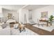 Cozy living room featuring a comfortable seating area, a bed, and a dedicated workspace with a desk at 136 Flora Ne Ave, Atlanta, GA 30307