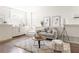 Bright and open living room showcasing a comfortable sofa, rug, and stylish decor at 136 Flora Ne Ave, Atlanta, GA 30307