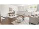 Open-concept living area with workspace, seating, and stylish features, perfect for relaxing or working at 136 Flora Ne Ave, Atlanta, GA 30307
