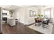 Open-concept living space featuring hardwood floors and modern finishes perfect for entertaining at 136 Flora Ne Ave, Atlanta, GA 30307