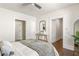 Bright main bedroom with hardwood floors and access to a walk-in closet at 136 Flora Ne Ave, Atlanta, GA 30307