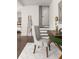 Bright workspace with a desk, chair, and stairs nearby at 136 Flora Ne Ave, Atlanta, GA 30307