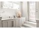 Stylish wet bar featuring modern fixtures, natural light, and ample counter space for entertaining at 136 Flora Ne Ave, Atlanta, GA 30307