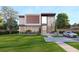 Modern two-story home featuring a well-manicured lawn, manicured landscaping, and an attached two-car garage at 1484 N Druid Hills Ne Rd, Brookhaven, GA 30319