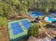 Two tennis courts, tennis pavilion and mature trees provide a wonderful amenity for this community at 1754 Water Springs Way, Dacula, GA 30019