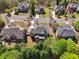 An aerial view of the home, showcasing its location among other homes and tree-lined streets at 1754 Water Springs Way, Dacula, GA 30019