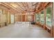 Unfinished basement space featuring windows to the backyard at 1754 Water Springs Way, Dacula, GA 30019