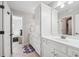 Bright bathroom with spacious vanity and ample storage cabinets and drawers at 1754 Water Springs Way, Dacula, GA 30019