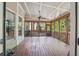 Charming screened-in porch offering a relaxing outdoor living space at 1754 Water Springs Way, Dacula, GA 30019