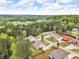 Spacious neighborhood features lush greenery, offering privacy and beautiful surroundings for comfortable suburban living at 505 Bryson Lake Cir, Douglasville, GA 30134