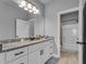 Bathroom with double vanity, granite countertops, and tile flooring at 505 Bryson Lake Cir, Douglasville, GA 30134