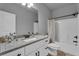 Beautiful bathroom with granite counters, a bathtub-shower, and modern fixtures at 505 Bryson Lake Cir, Douglasville, GA 30134