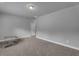 Large bedroom with neutral paint, carpet flooring, a modern ceiling fan and ample natural light at 505 Bryson Lake Cir, Douglasville, GA 30134