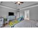 Spacious bedroom features carpeted floors, natural light, and ample space, combining comfort and style at 505 Bryson Lake Cir, Douglasville, GA 30134