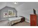 Cozy bedroom with sloped ceiling and natural light at 505 Bryson Lake Cir, Douglasville, GA 30134