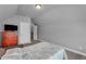 Bedroom features sloped ceilings and storage at 505 Bryson Lake Cir, Douglasville, GA 30134
