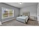Comfortable bedroom with large window and neutral decor at 505 Bryson Lake Cir, Douglasville, GA 30134