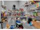A walk-in pantry with shelves filled with groceries, snacks, and household supplies for convenient storage at 505 Bryson Lake Cir, Douglasville, GA 30134