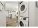 Convenient stackable washer and dryer in-unit laundry area, seamlessly blending functionality with modern living at 6820 Glenridge Dr # C, Sandy Springs, GA 30328