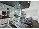 Cardio area featuring treadmills and elliptical machines with individual screens and city views at 860 Peachtree Ne St # 2716, Atlanta, GA 30308